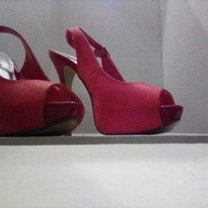Size 7 unworn pink open toed platforms